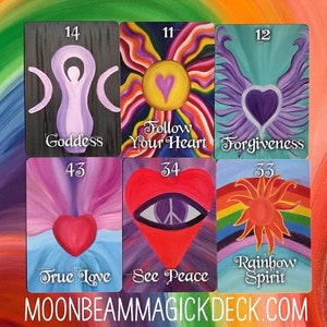May include: A collection of six colorful oracle cards. Each card features a unique design with symbols like hearts, suns, and wings. The cards have titles such as "Goddess," "Follow Your Heart," and "Forgiveness." The website address "MOONBEAMMAGICKDECK.COM" is at the bottom.