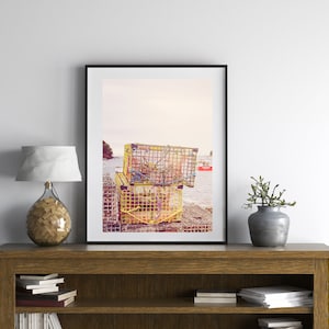 May include: A framed photograph of yellow lobster traps stacked on a wooden dock. The photo has a vintage filter applied, giving it a warm, nostalgic feel.