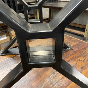 Metal table legs x style with square opening to hold beam.  Industrial modern table legs made in the usa