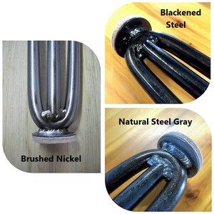 May include: Close-up of three metal table legs in three different finishes: brushed nickel, black, and natural steel grey. Each leg has a felt pad on the bottom.
