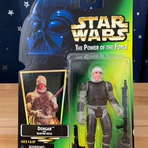 1997 Kenner STAR WARS Power of the Force Dengar with Blaster Rifle Mint on Hologram Card