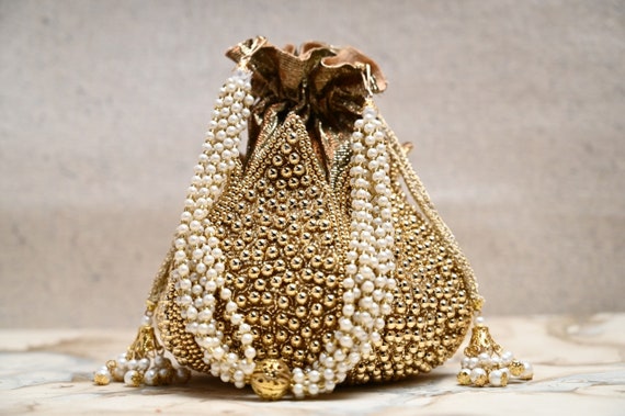 Ozel | Grand Golden Velvet Potli Bag | INDIASPOPUP.COM