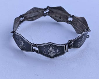 vintage Siam-zilveren en Niello-paneelarmband met godinnen/dansers, circa 1960-70