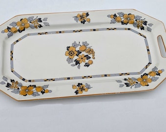 Plato para servir vintage, pequeño y rectangular, con diseño Art Déco en amarillo y gris, «Otoño de 1896», de Myott, hijo y compañía, circa 1930-1950.
