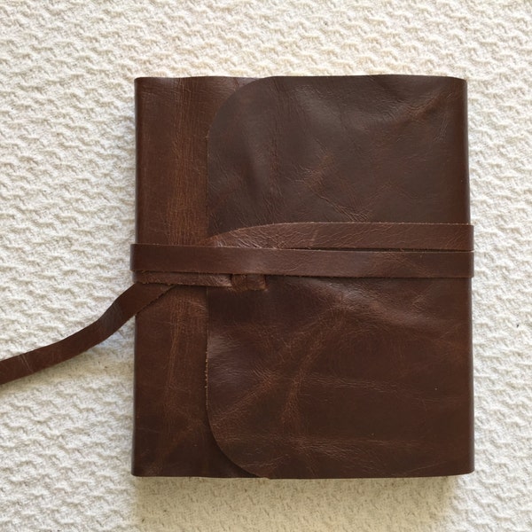 NIV Journaling Bible recovered cowhide leather cover flap with leather strap
