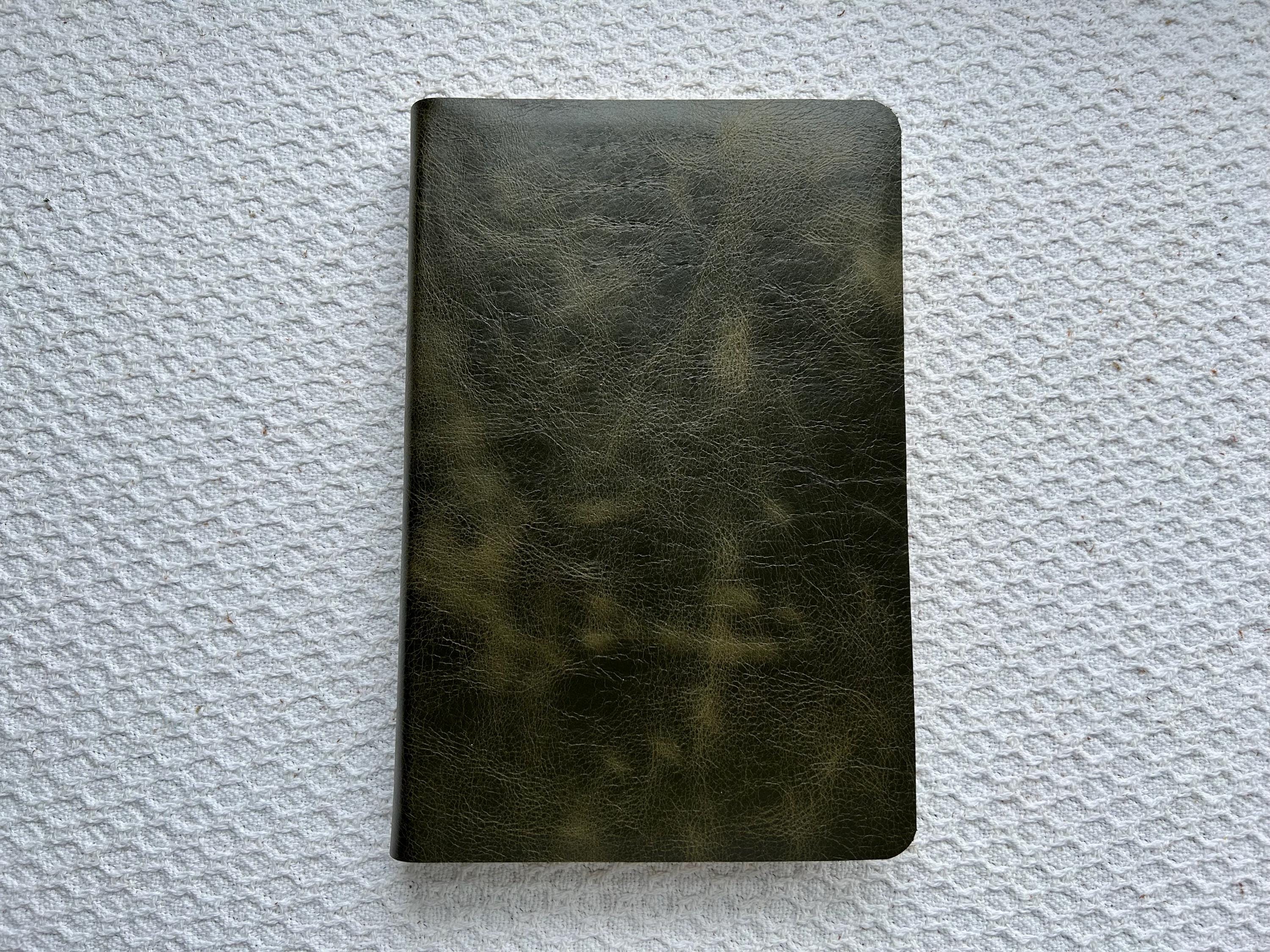 CSB Thinline Bible recovered in cowhide leather covered Leather CSB Bible