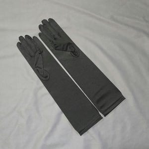 Bridal or Prom Gloves New in package black satin. Approximately 15 inches long