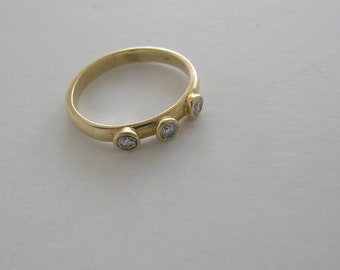 Diamond Ring 14K Yellow Gold 3 Diamonds TDW 0.15 G/H Color VS Clarity Designed by  Wm. Madison Beverly Hills, CA Circa 1970