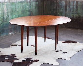 PENDING** 1960s Mid Century Oval Walnut Drop Leaf Gate Leaf Dining Table by Edward Wormley