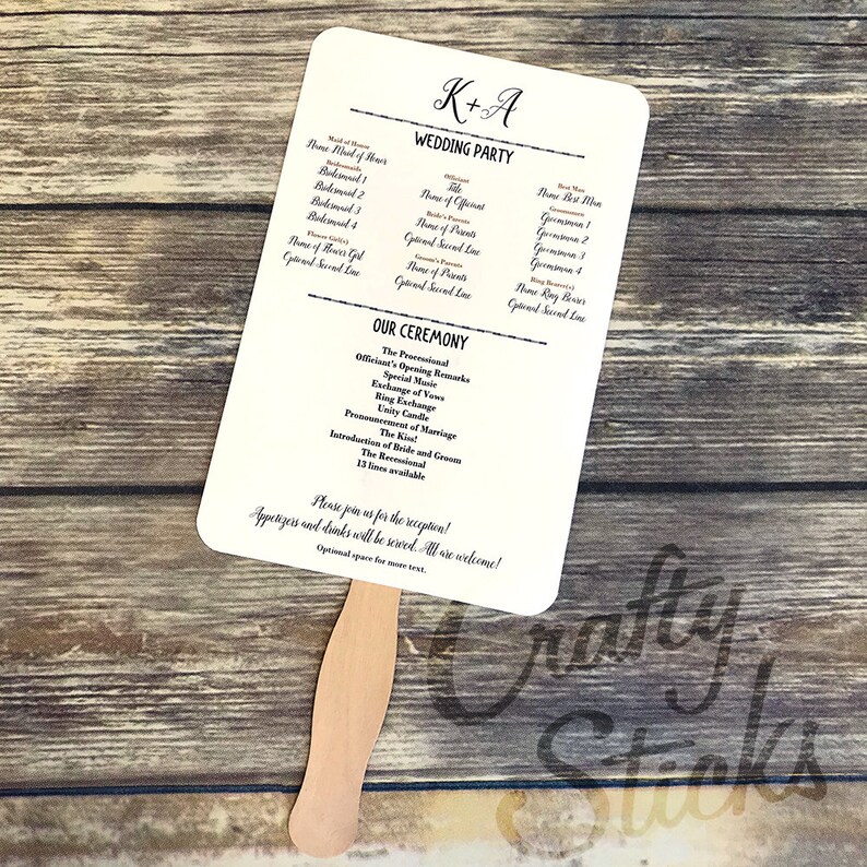 May include: A white wedding program fan with black text. The fan features the couple's names, K+A, and the wedding party. The ceremony order is listed on the back of the fan.