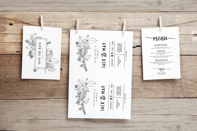 K&ouml;nnte beinhalten: Drei wei&szlig;e Karten mit schwarzer Tinte, die an einer Schnur mit W&auml;scheklammern h&auml;ngen. Die erste Karte sagt "Save the Date" mit einem floralen Design. Die zweite und dritte Karte sind Hochzeitseinladungen f&uuml;r Jack und May, mit Datum und Uhrzeit der Hochzeit. Die dritte Karte ist ein Men&uuml; mit den Worten "Speisekarte", "Vorspeisen", "Hauptgerichte", "Nachspeisen" und "Guten Appetit".