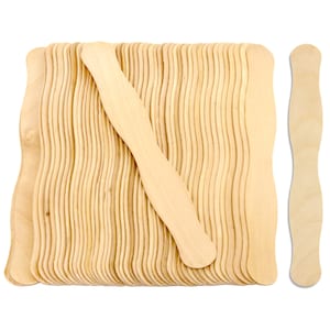 May include: A stack of 50 natural wood craft sticks with a wavy edge. The sticks are approximately 6 inches long and 1 inch wide.