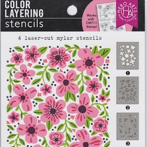May include: Four laser-cut mylar stencils for cardmaking and crafting. The stencils feature a floral design with pink flowers and green leaves. The stencils are 5.25 inches by 6.5 inches and work well with inks, watercolors, sprays, and more.