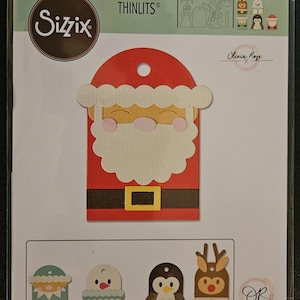 Puede incluir: Juego de troqueles Sizzix Thinlits con un diseño de etiqueta de Papá Noel y otras formas festivas, como un muñeco de nieve, un pingüino y un reno. El juego incluye 9 troqueles y otras herramientas de corte. Diseñado por Olivia Rose.