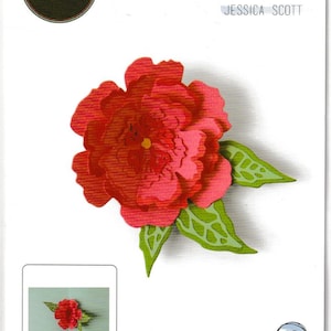 May include: A Sizzix Thinlits die set featuring a red paper flower with green leaves. The packaging includes the text "Sizzix", "Thinlits", and "Jessica Scott". The set includes 10 dies for paper crafting.