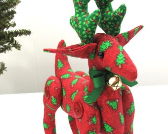 Christmas Reindeer Decoration~~Handcrafted Christmas Reindeer~~Fabric Soft Body Reindeer~~Tossed Trees on Red Fabric~~Reindeer Decoration