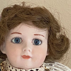 Beily The Antique Haunted Doll