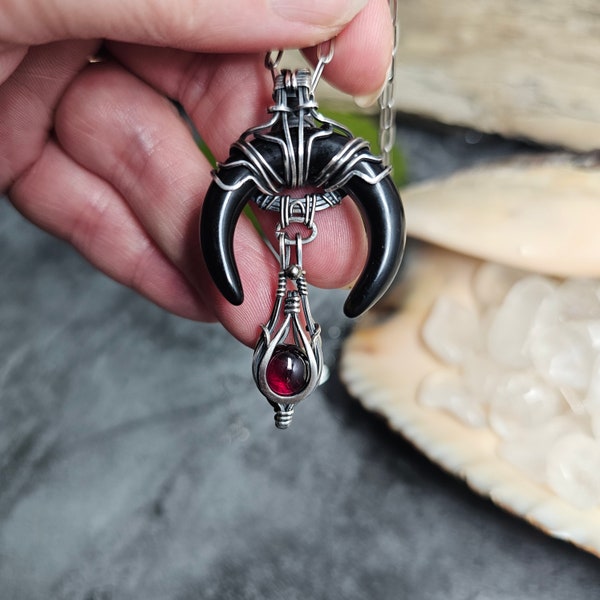 Black onyx crescent moon with silver backed garnet gemstone sterling silver wire wrapped Sam Art Design Amulet