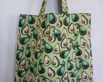 Curved Bottom Avocados On Green Tote