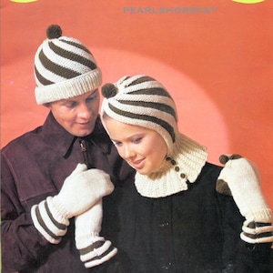 May include: A couple wearing matching striped knit hats and mittens. The hats have pom-poms on top and the mittens have striped cuffs. The hats and mittens are in shades of brown and white.