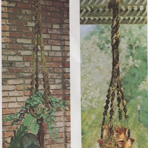 May include: Two macrame plant hangers. One is suspended in front of a brick wall, holding a pot with green leafy plants. The other is hanging outdoors, holding a decorative pot filled with greenery. Both are made of brown and green rope.