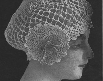 May include: A white crocheted hat with a delicate lace design and tassels. The hat is worn on a mannequin's head.