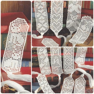 May include: A collection of white crocheted bookmarks featuring intricate openwork patterns and geometric designs. Each rectangular bookmark is finished with a delicate white thread tassel at the bottom edge, showcasing detailed needlework craftsmanship.