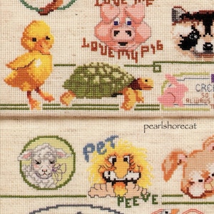 May include: Cross-stitch pattern sampler with various animal designs, including a duckling, pig, turtle, raccoon, lion, lamb, and bunny. The sampler includes the text "Love Me", "Love My Pig", "Pet", and "Peeve".