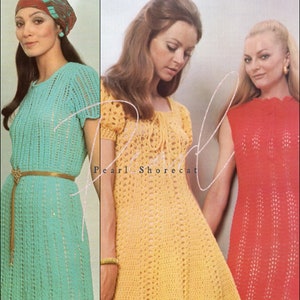 May include: Three women wearing crocheted dresses. The dress on the left is turquoise, the middle dress is yellow, and the dress on the right is red. The text "Pearl Shorecat" is visible in the image.