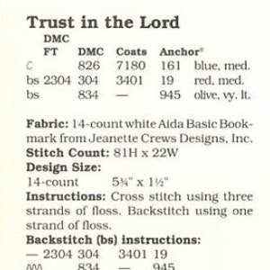 May include: Cross stitch pattern chart for "Trust in the Lord" with DMC, Coats, and Anchor floss colors listed. The pattern is 81 stitches high by 22 stitches wide and uses 14-count white Aida fabric.