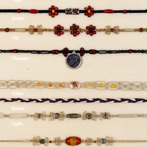 May include: A collection of handmade macrame bracelets in various styles. The bracelets feature intricate knotwork, beads, and decorative elements. Colors include brown, red, blue, and gold. Each bracelet has a unique design, with names like "Pibine" and "Jeucutie" displayed.