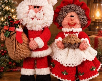 May include: Two crocheted dolls representing Santa Claus and Mrs. Claus. Santa wears a red suit with white trim, a hat, and carries a brown sack filled with gifts. Mrs. Claus wears a red dress with a white apron and holds a small brown pie.
