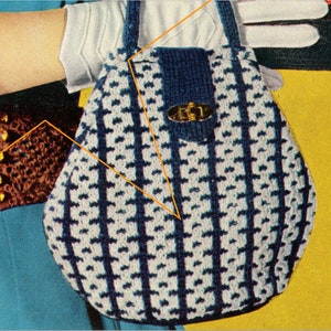 May include: A white and blue crocheted handbag with a blue knitted flap and a gold metal clasp.