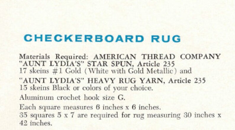 May include: A vintage instruction sheet for a "CHECKERBOARD RUG" with text in blue. The instructions list materials, including yarn and an aluminum crochet hook. Each square measures 6 inches x 6 inches, and the finished rug will measure 30 inches x 42 inches.