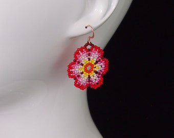Huichol style seed bead flower earrings! bright light red and pink beaded floral earrings. handmade beaded dangle earrings.