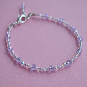 light violet and rainbow finished Czech glass fully hand beaded bracelet. crystal and glass beaded bracelet. light, feminine, and pretty!
