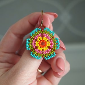 Huichol style seed bead flower earrings! rainbow turquoise and olive green beaded floral earrings. handmade beaded dangle earrings.