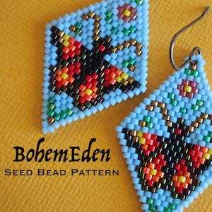 May include: Two beaded earrings with a butterfly design. The earrings are diamond-shaped and feature a light blue background with a butterfly in black, red, yellow, and orange. The earrings have silver-colored hooks. The text "BohemEden Seed Bead Pattern" is in the image.