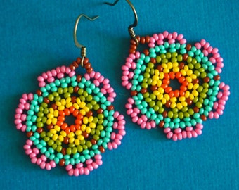 Huichol style seed bead flower earrings! bright pink and rainbow turquoise beaded floral earrings. handmade beaded dangle earrings.