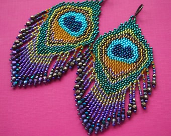 insanely epic beaded peacock feather statement fringe earrings! large Toho seed bead peacock earrings with Czech glass sparkle