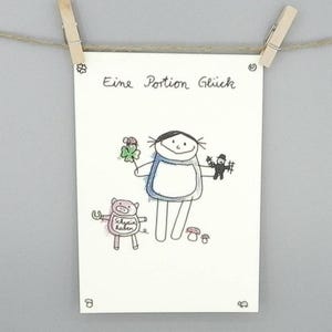 Eine Portion Glück Postkarte von nini san mit Mädchen und Glückssymbolen