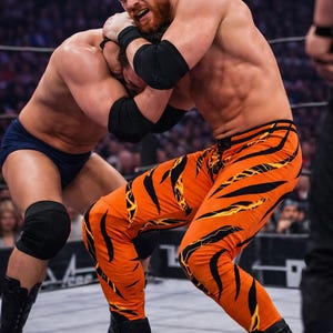 wrestling professionistico, cosplay, collant da uomo, pantaloni arancioni con stampa di fulmini. Taglia L immagine 4