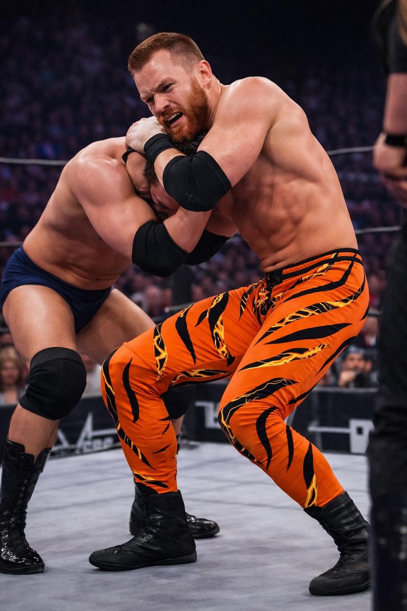wrestling professionistico, cosplay, collant da uomo, pantaloni arancioni con stampa di fulmini. Taglia L immagine 4