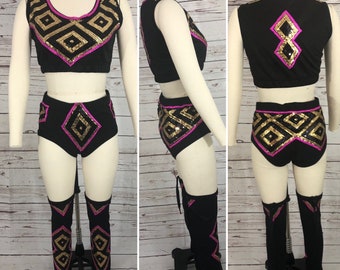 Pro wrestling woman’s gear  black gold pink size medium