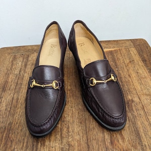 Vintage 1990&#39;s Barker of Earls Barton Loafer Shoes in Burgundy Red Leather With A Gold Snaffle Chain. Chunky Wooden Heels. UK Size 8.