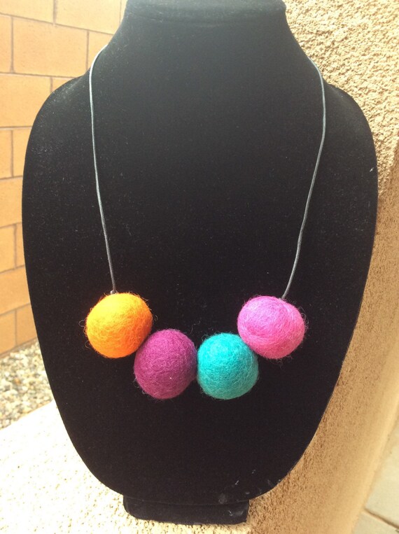 Items similar to Felt ball necklace on Etsy