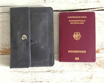 Grey passport wallet with 6 compartments made of leather