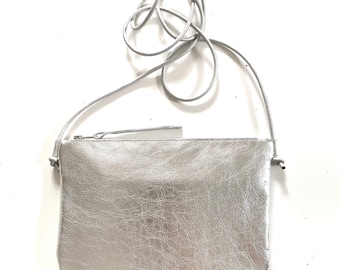 Silver leather shoulder bag with grey leather strap for parties or holidays, adjustable length