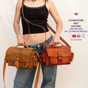 May include: Two brown leather Livingstone bags with adjustable shoulder straps and buckle closures. The bags have a rectangular shape with a handle on top and a small pocket on the side. The bags are in different shades of brown.