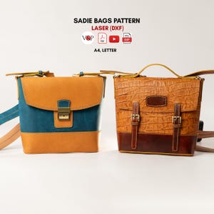 May include: Two leather bags with the text SADIE BAGS PATTERN LASER (DXF) A4, LETTER. The left bag is tan and blue with a metal clasp. The right bag is textured brown with two buckle straps. Both bags feature top handles and shoulder straps.
